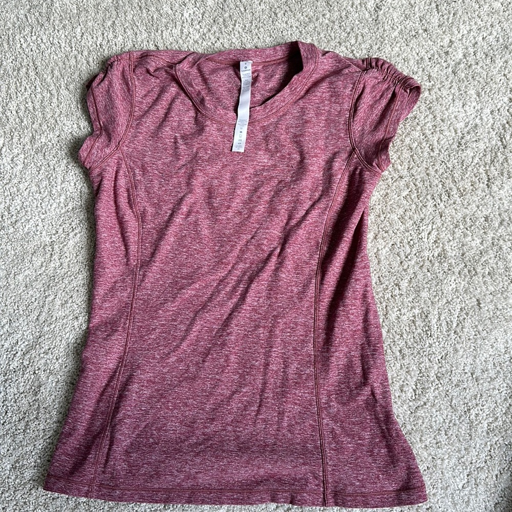 Pink Lululemon athletic shirt